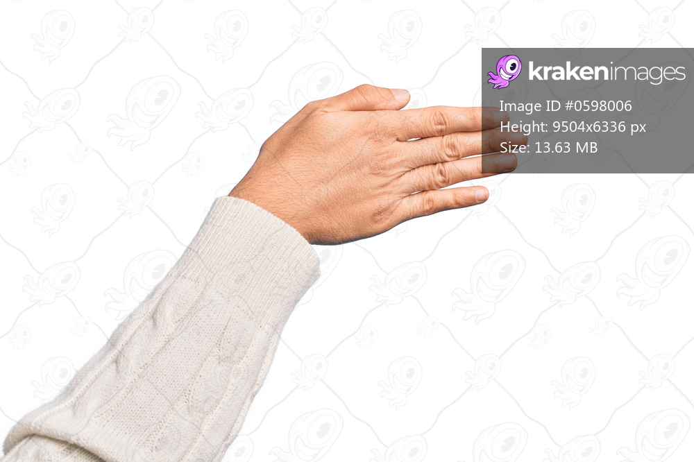 Hand of caucasian young man showing fingers over isolated white background stretching and reaching with open hand for handshake, showing back of the hand