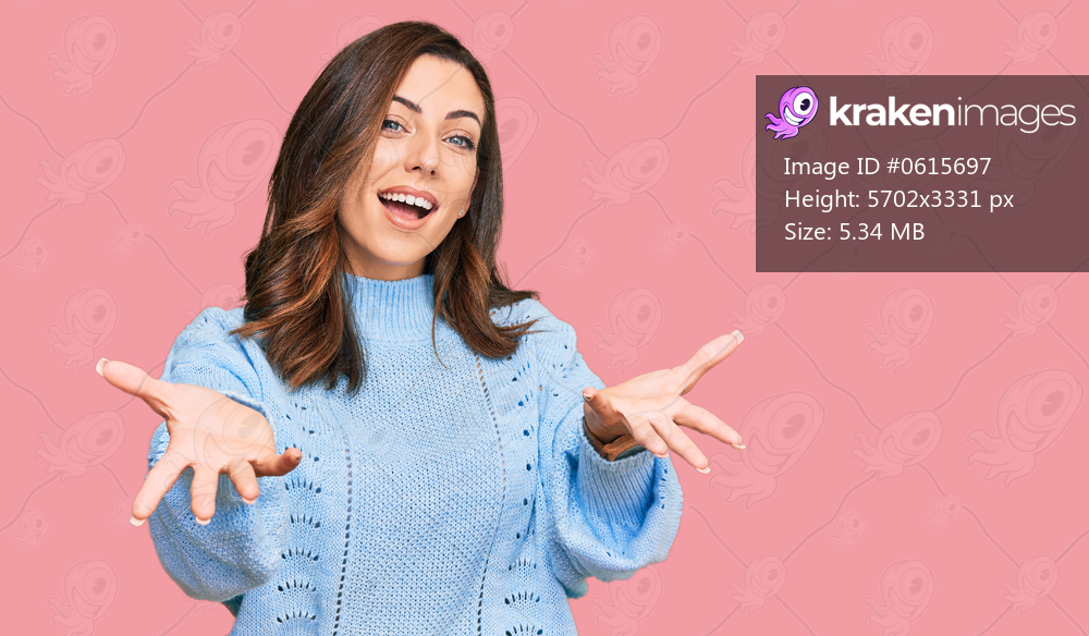 Young brunette woman wearing casual winter sweater smiling cheerful offering hands giving assistance and acceptance. 