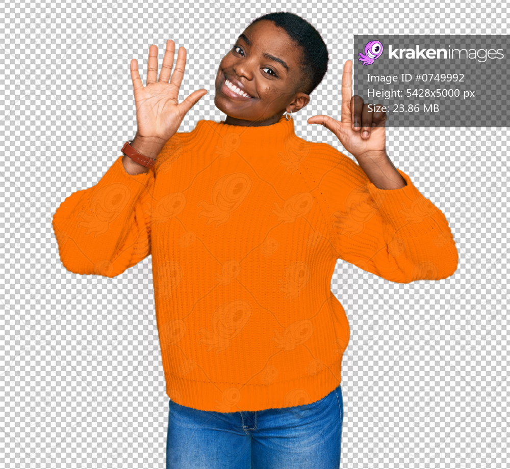 Young african american woman wearing casual clothes showing and pointing up with fingers number seven while smiling confident and happy.