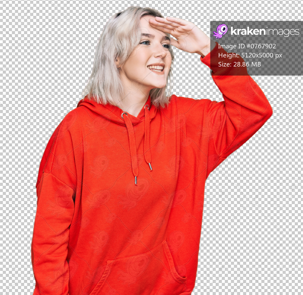 Young blonde girl wearing casual clothes very happy and smiling looking far away with hand over head. searching concept.