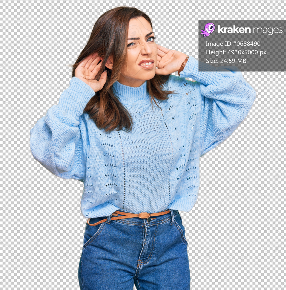 Young brunette woman wearing casual winter sweater trying to hear both hands on ear gesture, curious for gossip. hearing problem, deaf