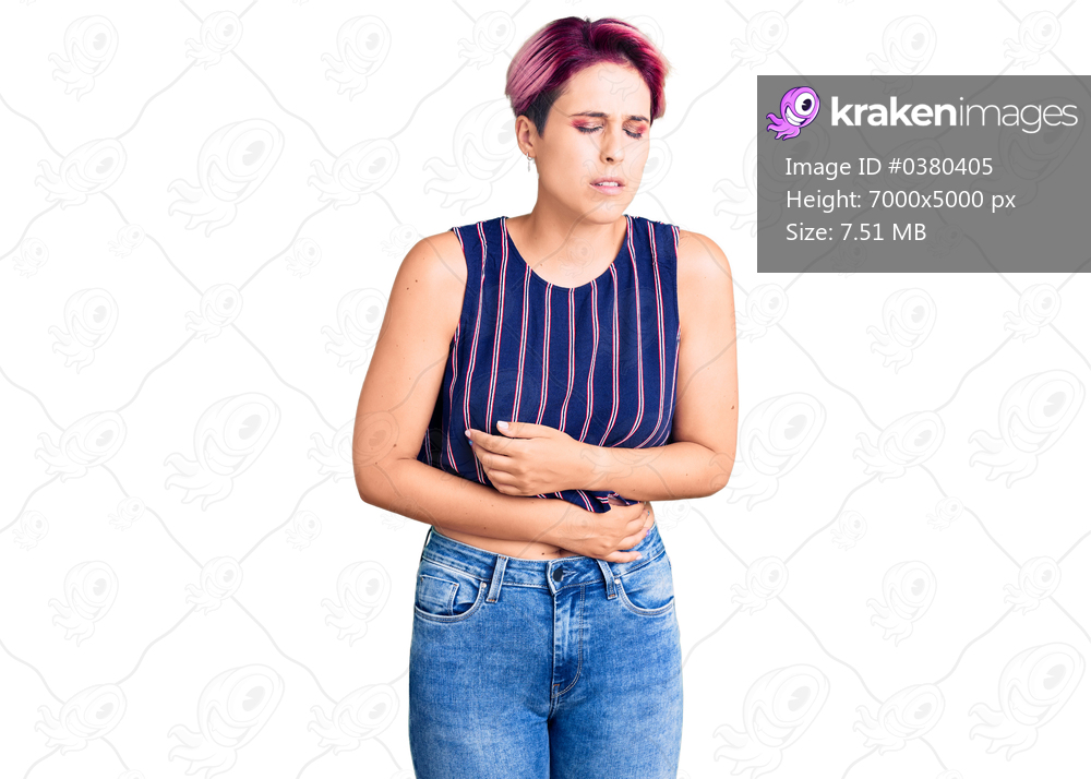 Young beautiful woman with pink hair wearing casual clothes with hand on stomach because indigestion, painful illness feeling unwell. ache concept. 