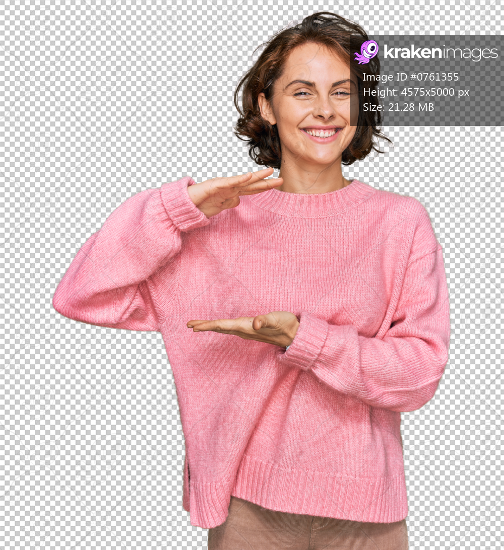 Young hispanic woman wearing casual clothes gesturing with hands showing big and large size sign, measure symbol. smiling looking at the camera. measuring concept.