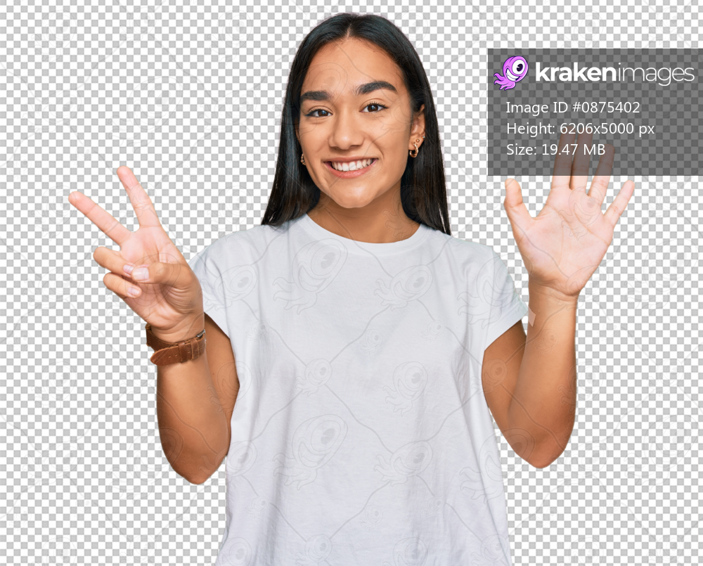 Young asian woman wearing casual white t shirt showing and pointing up with fingers number seven while smiling confident and happy.