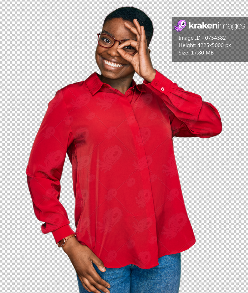 Young african american woman wearing casual clothes and glasses smiling happy doing ok sign with hand on eye looking through fingers