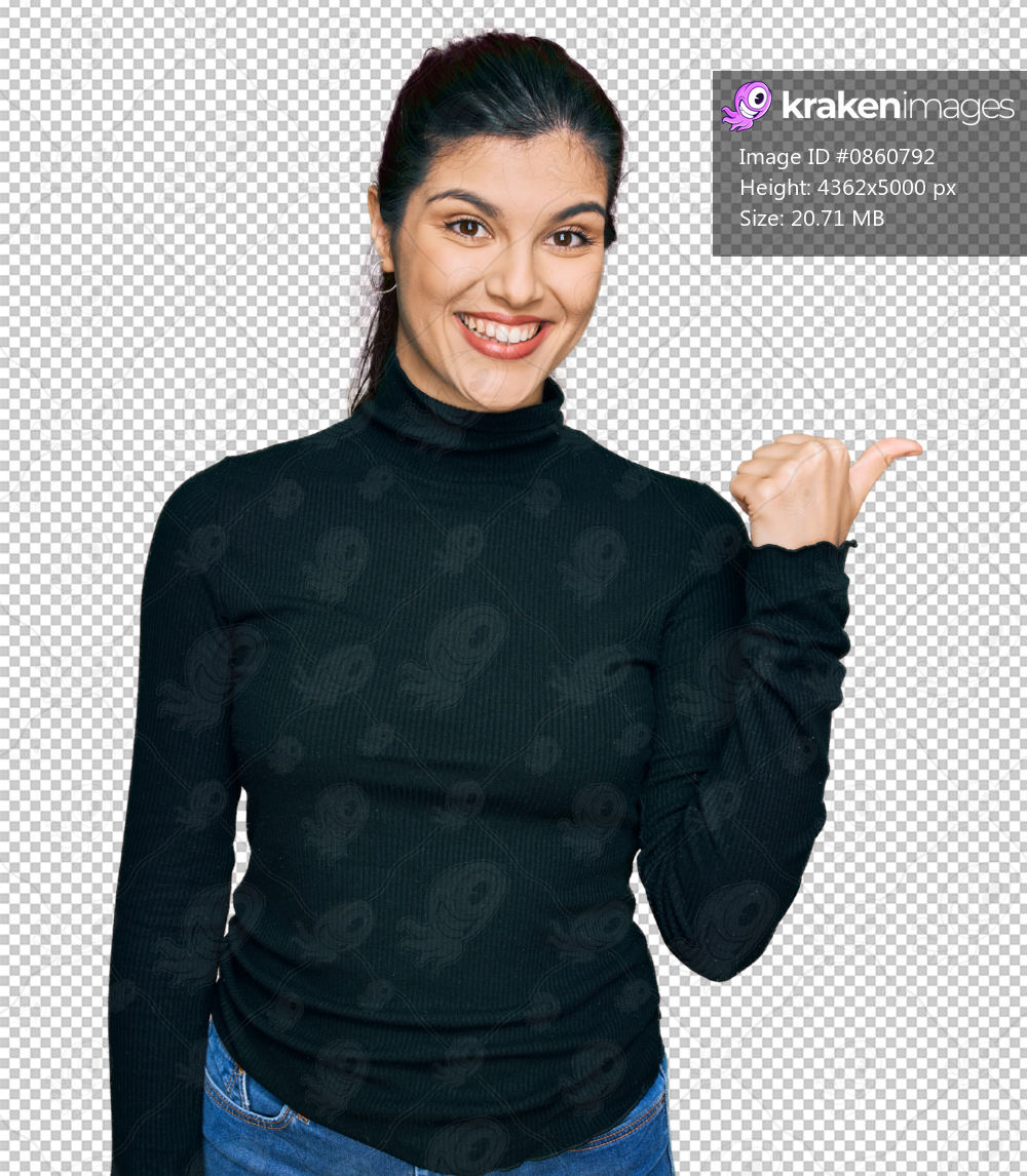 Young hispanic woman wearing casual clothes smiling with happy face looking and pointing to the side with thumb up.