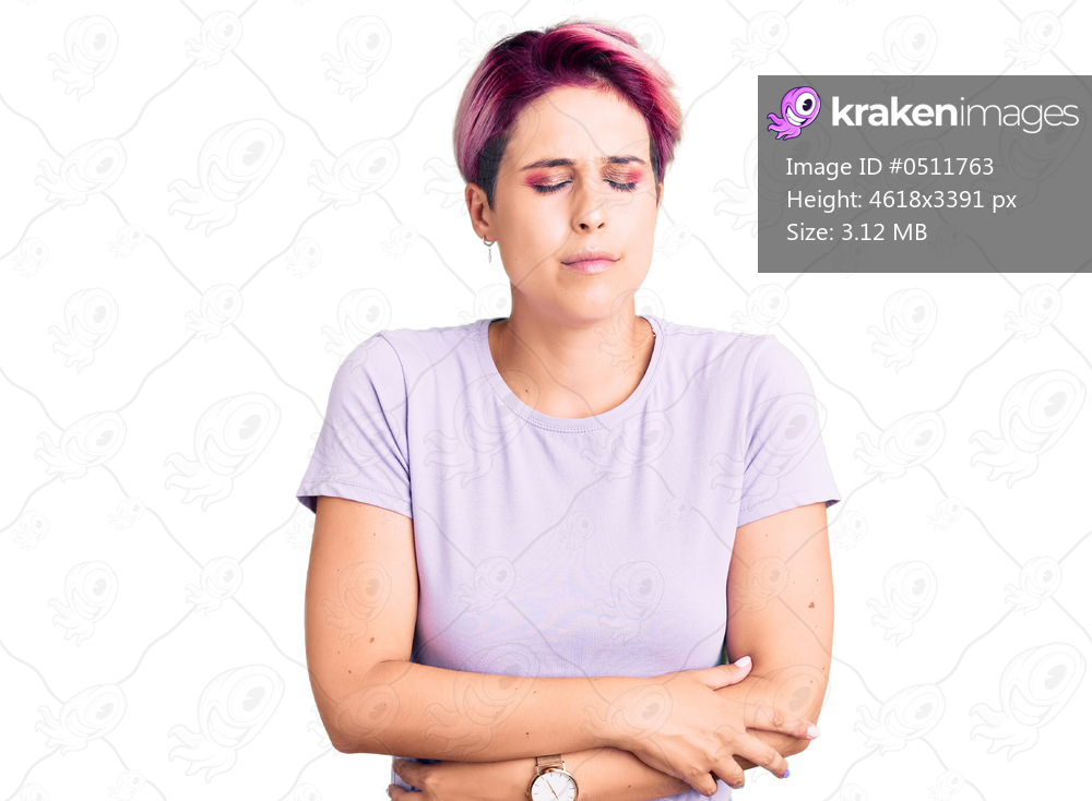 Young beautiful woman with pink hair wearing casual clothes with hand on stomach because indigestion, painful illness feeling unwell. ache concept. 