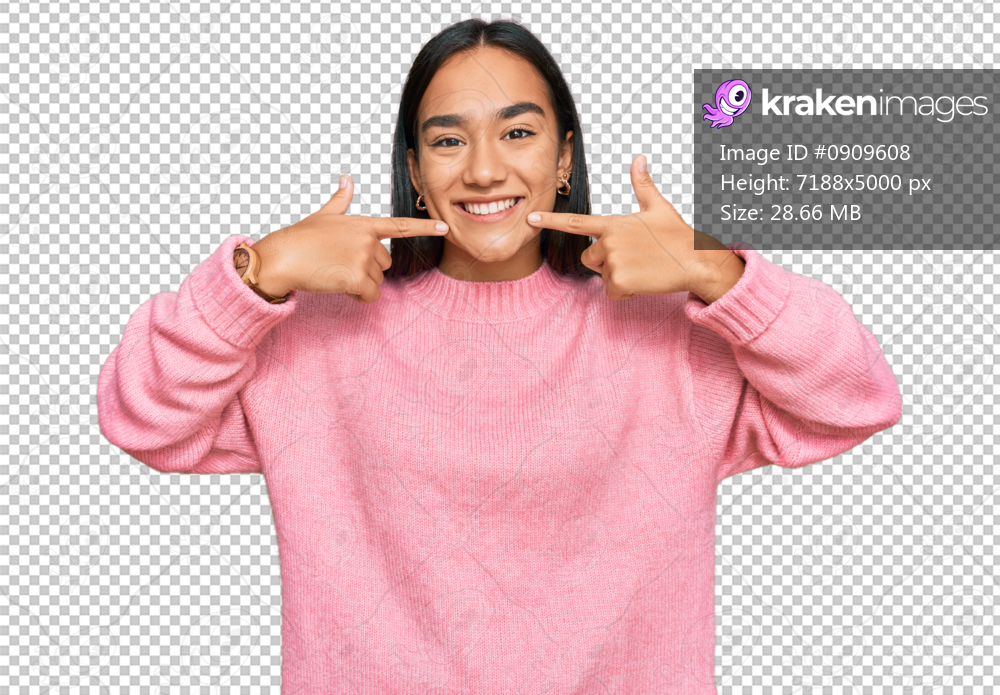 Young asian woman wearing casual winter sweater smiling cheerful showing and pointing with fingers teeth and mouth. dental health concept.