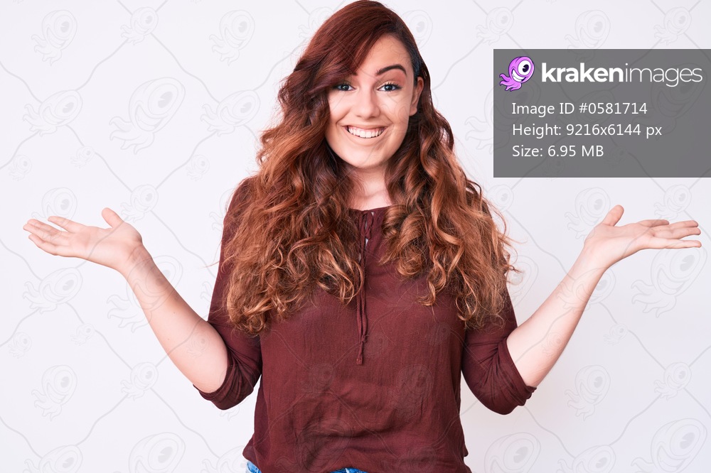 Young beautiful woman wearing casual clothes celebrating victory with happy smile and winner expression with raised hands 
