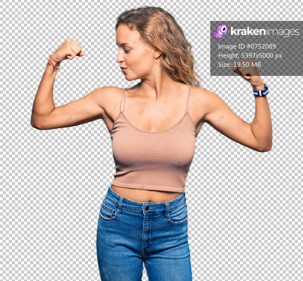 Beautiful caucasian woman wearing casual clothes showing arms muscles smiling proud. fitness concept.