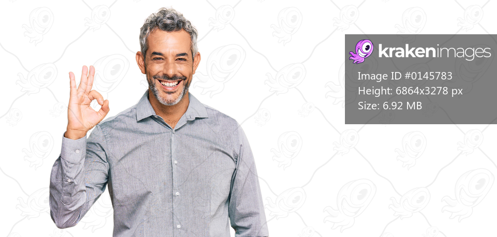 Middle age grey-haired man wearing casual clothes smiling positive doing ok sign with hand and fingers. successful expression. 