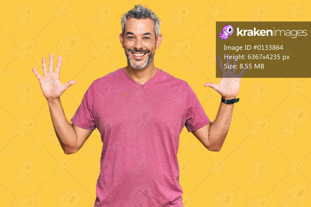 Middle age grey-haired man wearing casual clothes showing and pointing up with fingers number ten while smiling confident and happy. 