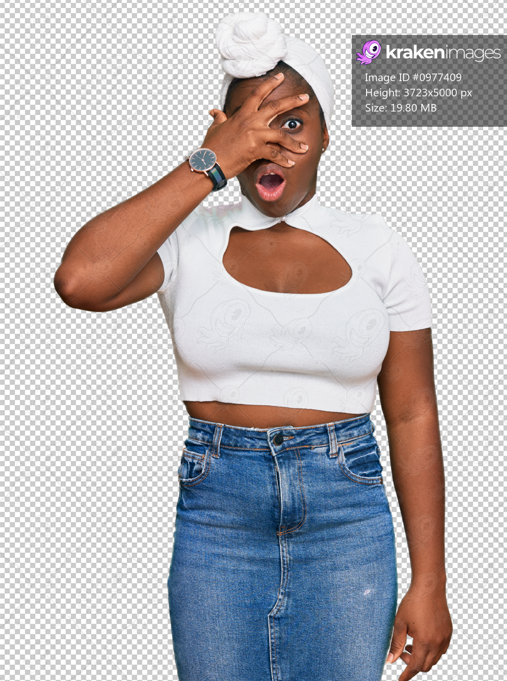 Young african woman with turban wearing hair turban over isolated background peeking in shock covering face and eyes with hand, looking through fingers with embarrassed expression.