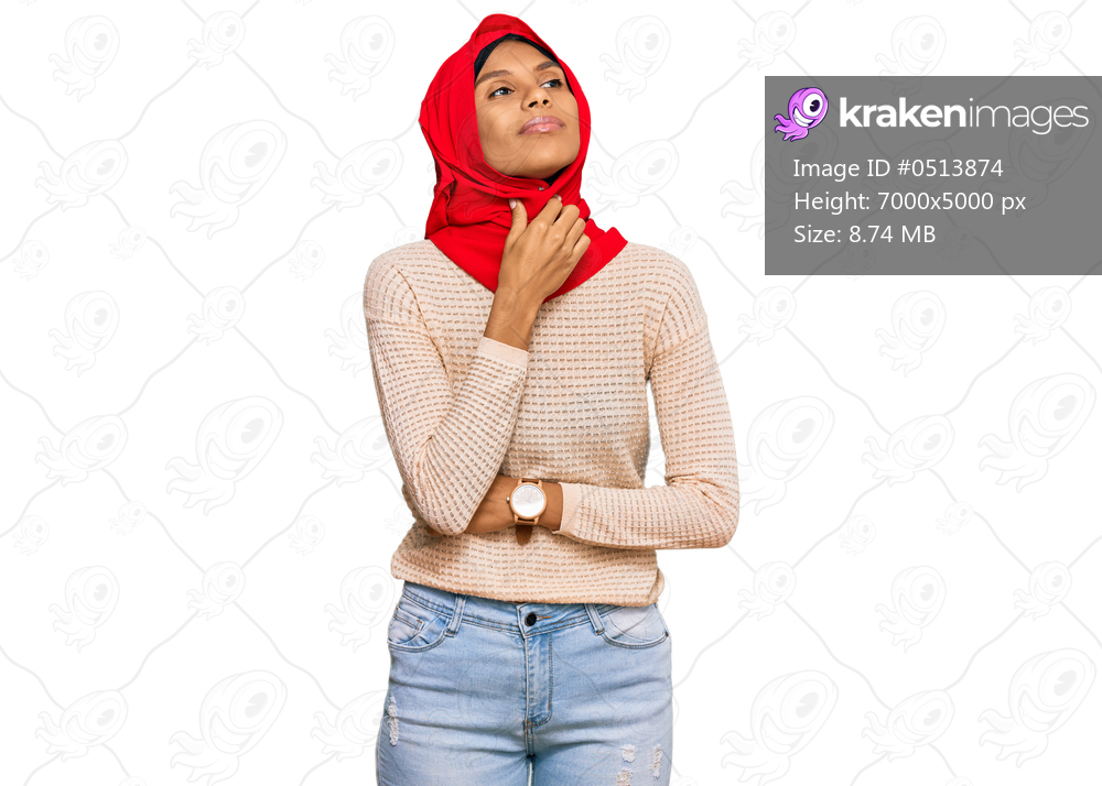 Young african american woman wearing traditional islamic hijab scarf touching painful neck, sore throat for flu, clod and infection 