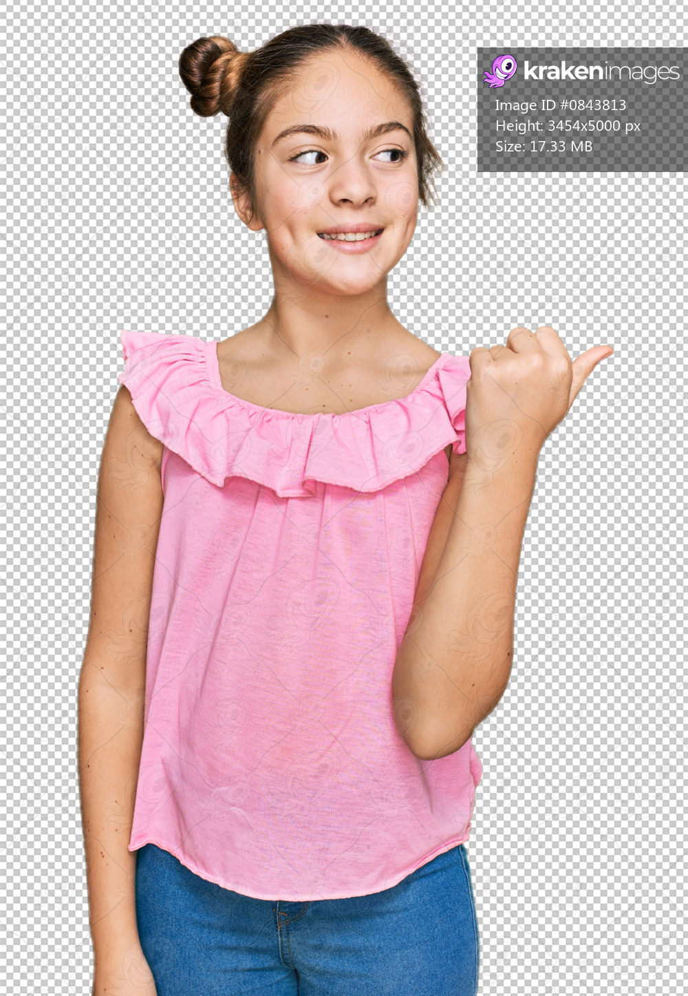 Beautiful brunette little girl wearing summer pink shirt smiling with happy face looking and pointing to the side with thumb up.