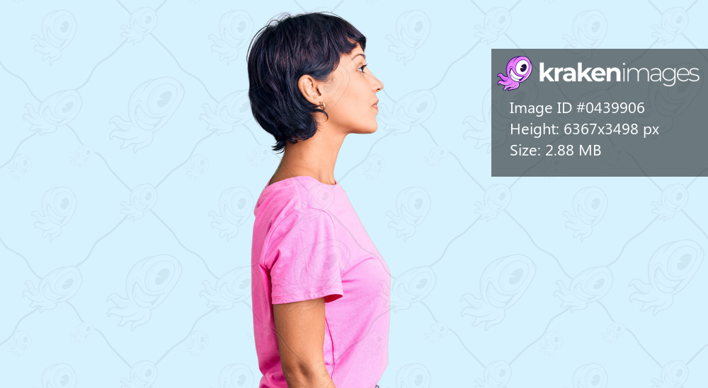 Young brunette woman with short hair wearing casual clothes looking to side, relax profile pose with natural face with confident smile. 