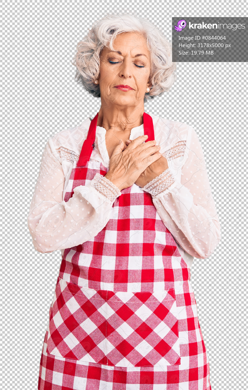 Senior grey-haired woman wearing apron smiling with hands on chest with closed eyes and grateful gesture on face. health concept.