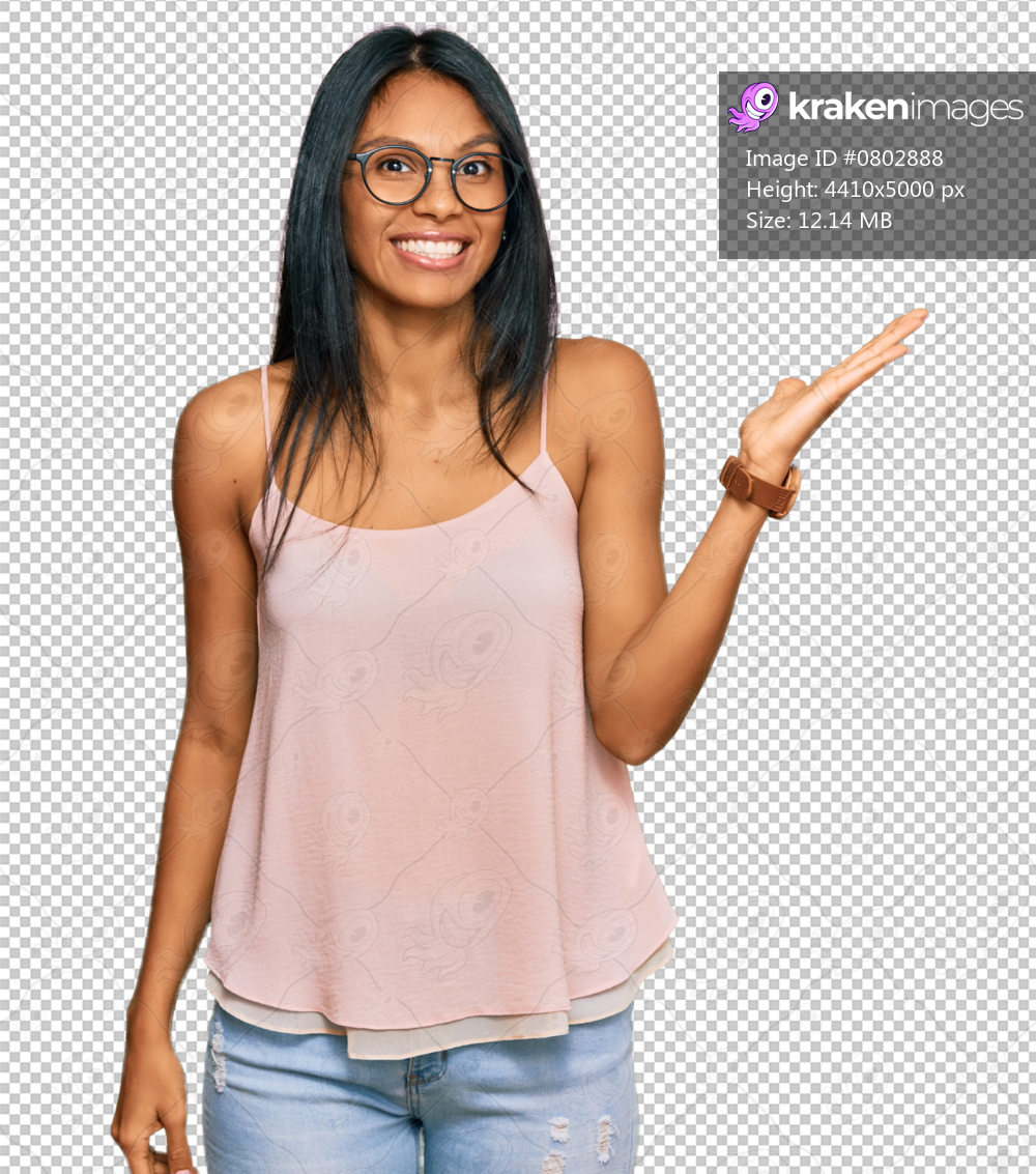 Young african american woman wearing casual clothes and glasses smiling cheerful presenting and pointing with palm of hand looking at the camera.