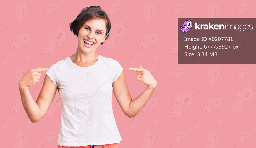 Beautiful young woman with short hair wearing casual clothes looking confident with smile on face, pointing oneself with fingers proud and happy. 