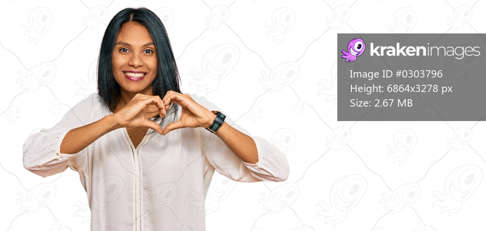 Young african american woman wearing casual clothes smiling in love showing heart symbol and shape with hands. romantic concept. 