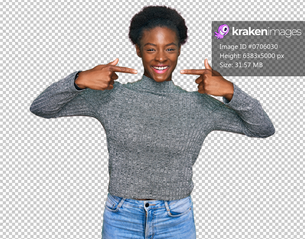 Young african american girl wearing casual clothes smiling cheerful showing and pointing with fingers teeth and mouth. dental health concept.
