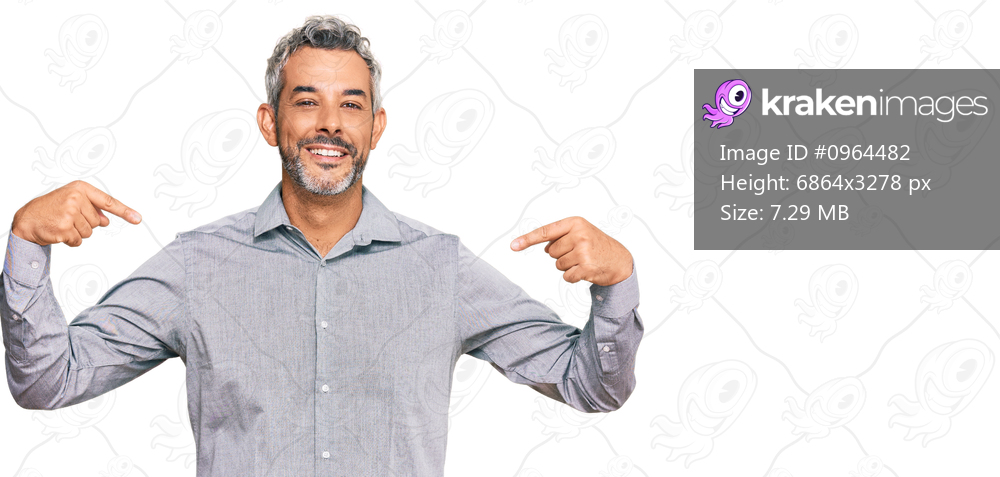Middle age grey-haired man wearing casual clothes looking confident with smile on face, pointing oneself with fingers proud and happy. 