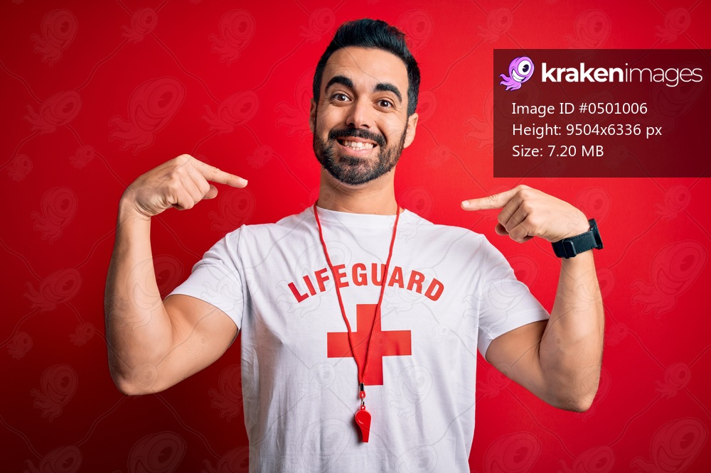 Young handsome lifeguard man with beard wearing whistle over isolated red background looking confident with smile on face, pointing oneself with fingers proud and happy.