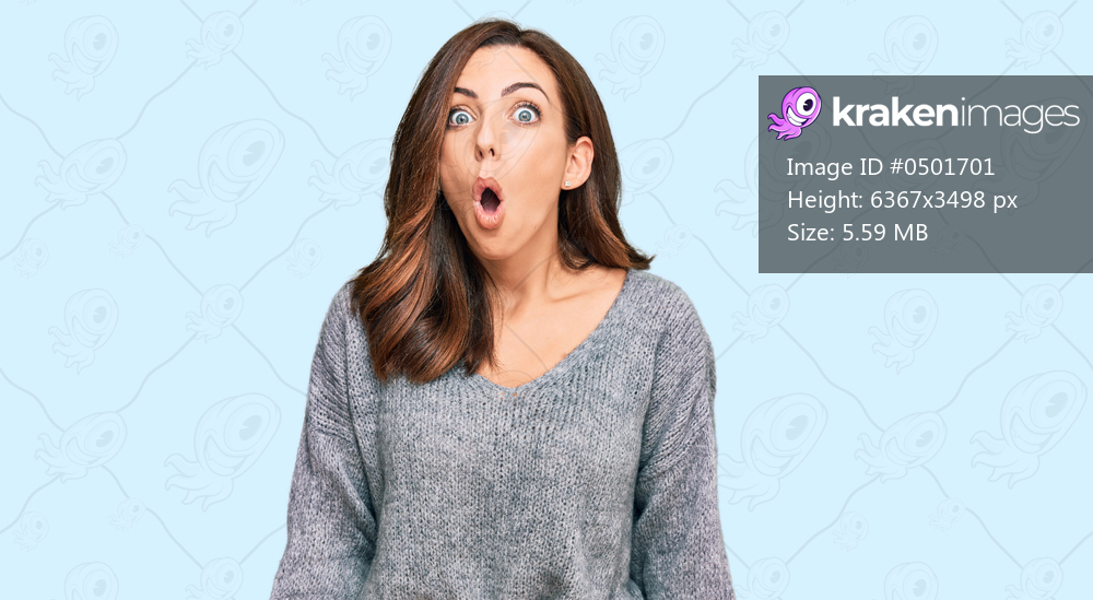 Young brunette woman wearing casual winter sweater scared and amazed with open mouth for surprise, disbelief face 