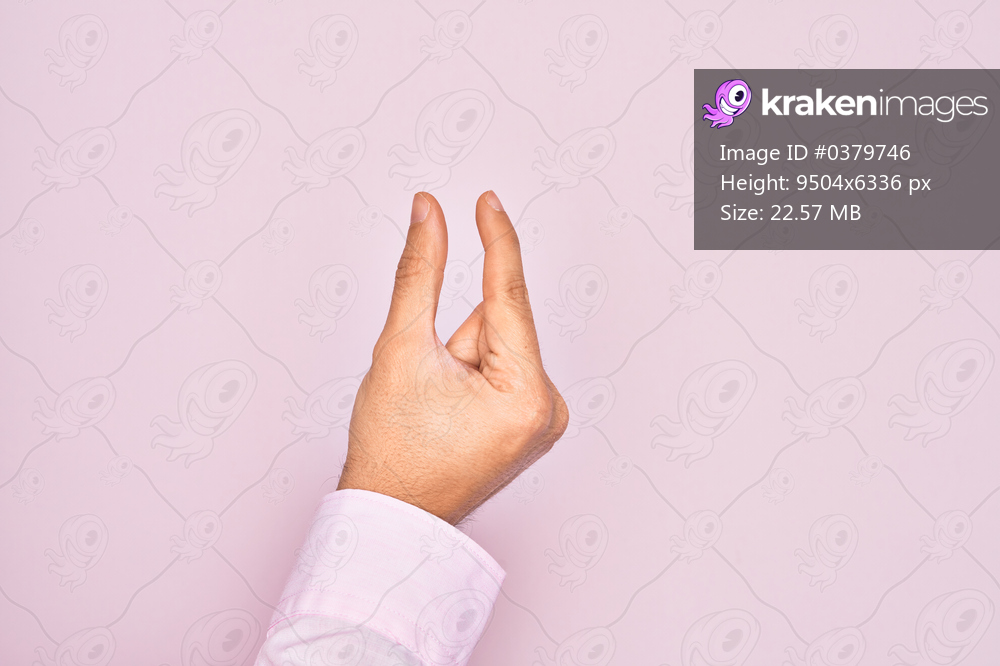 Hand of caucasian young man showing fingers over isolated pink background picking and taking invisible thing, holding object with fingers showing space