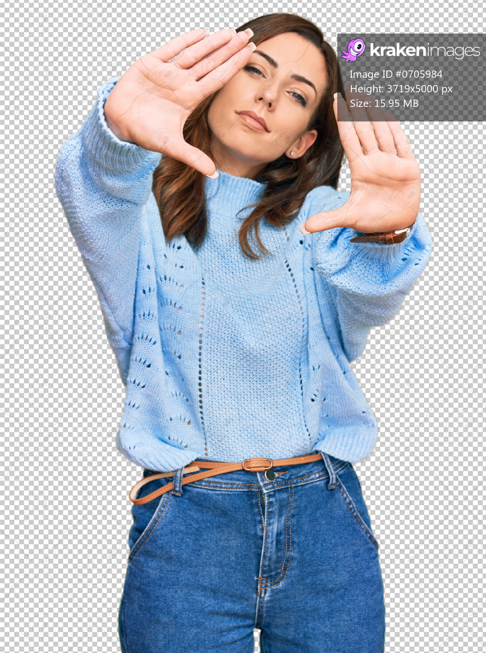 Young brunette woman wearing casual winter sweater doing frame using hands palms and fingers, camera perspective