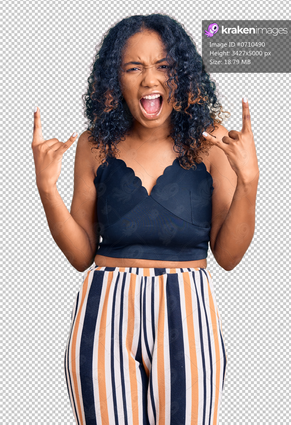 Young african american woman wearing casual clothes shouting with crazy expression doing rock symbol with hands up. music star. heavy concept.