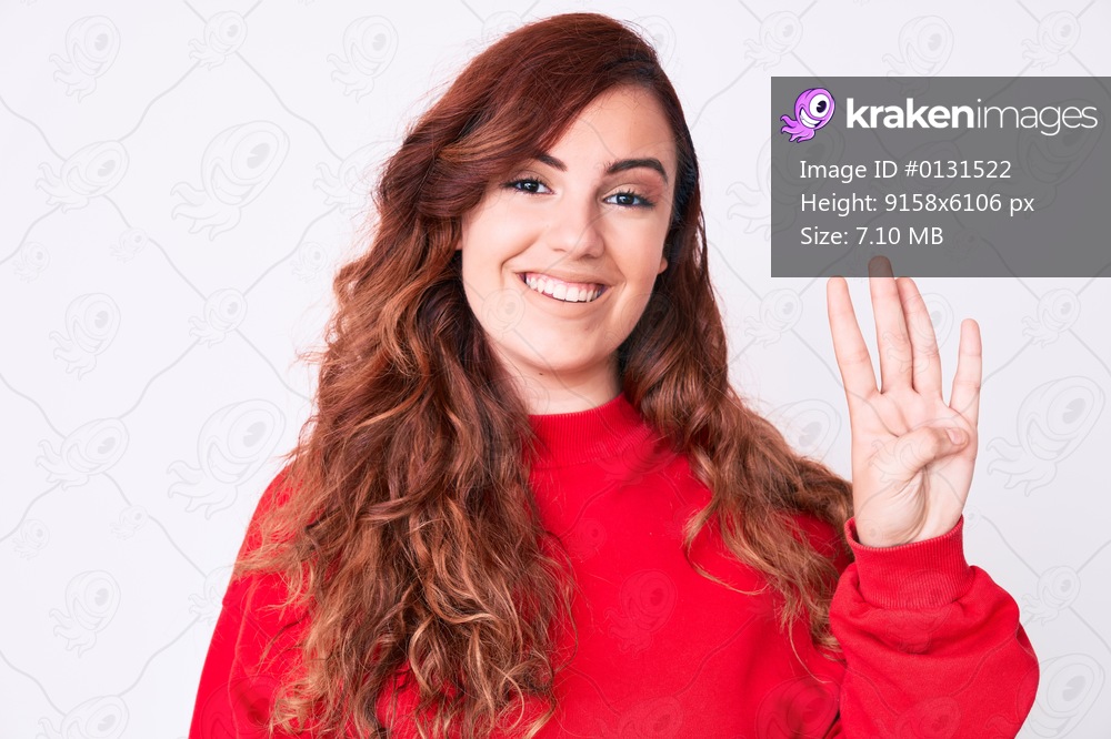Young beautiful woman wearing casual clothes showing and pointing up with fingers number four while smiling confident and happy. 