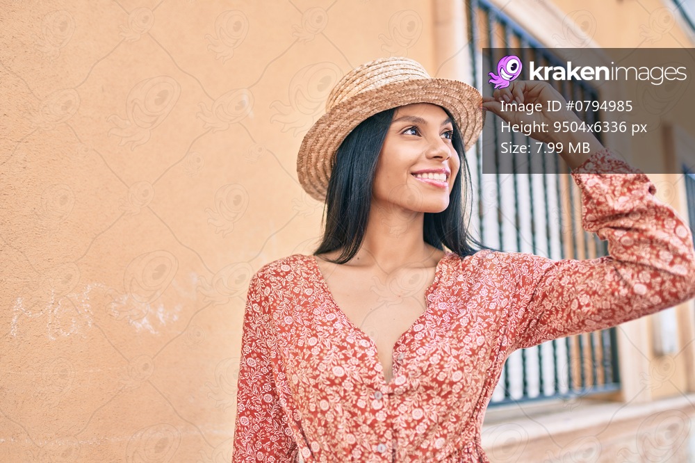 Young african american tourist woman on vacation smiling happy walking at the city.