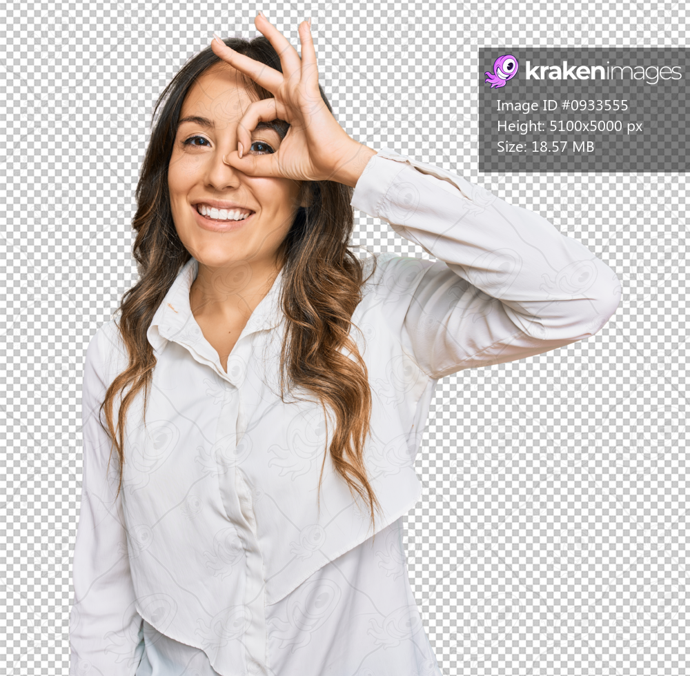 Young brunette woman wearing casual clothes doing ok gesture with hand smiling, eye looking through fingers with happy face.
