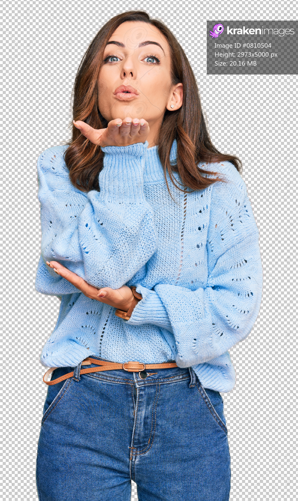 Young brunette woman wearing casual winter sweater looking at the camera blowing a kiss with hand on air being lovely and sexy. love expression.