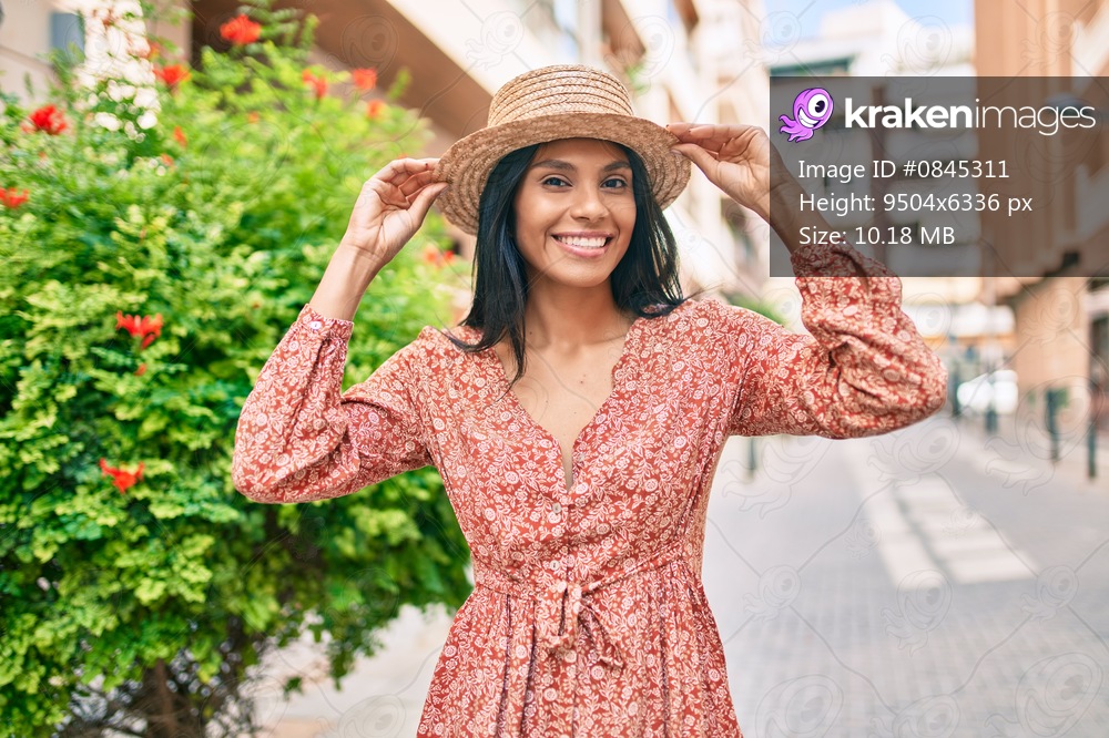 Young african american tourist woman on vacation smiling happy walking at the city.