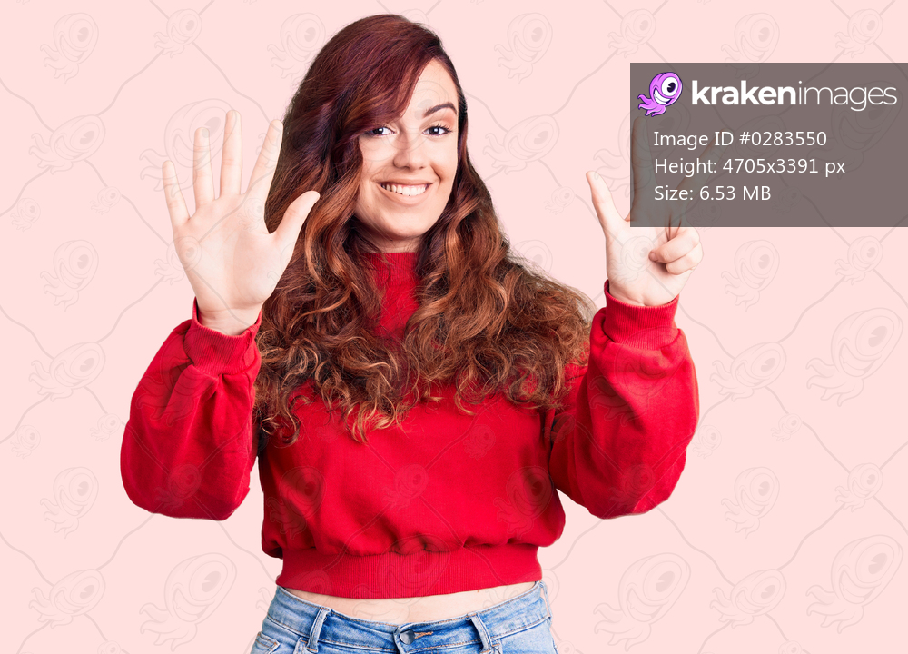 Young beautiful woman wearing casual winter sweater showing and pointing up with fingers number eight while smiling confident and happy. 