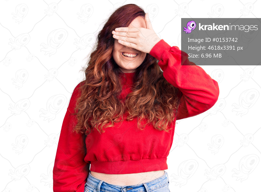 Young beautiful woman wearing casual winter sweater smiling and laughing with hand on face covering eyes for surprise. blind concept. 