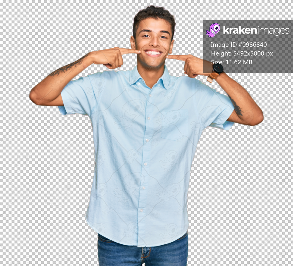 Young handsome african american man wearing casual clothes smiling cheerful showing and pointing with fingers teeth and mouth. dental health concept.