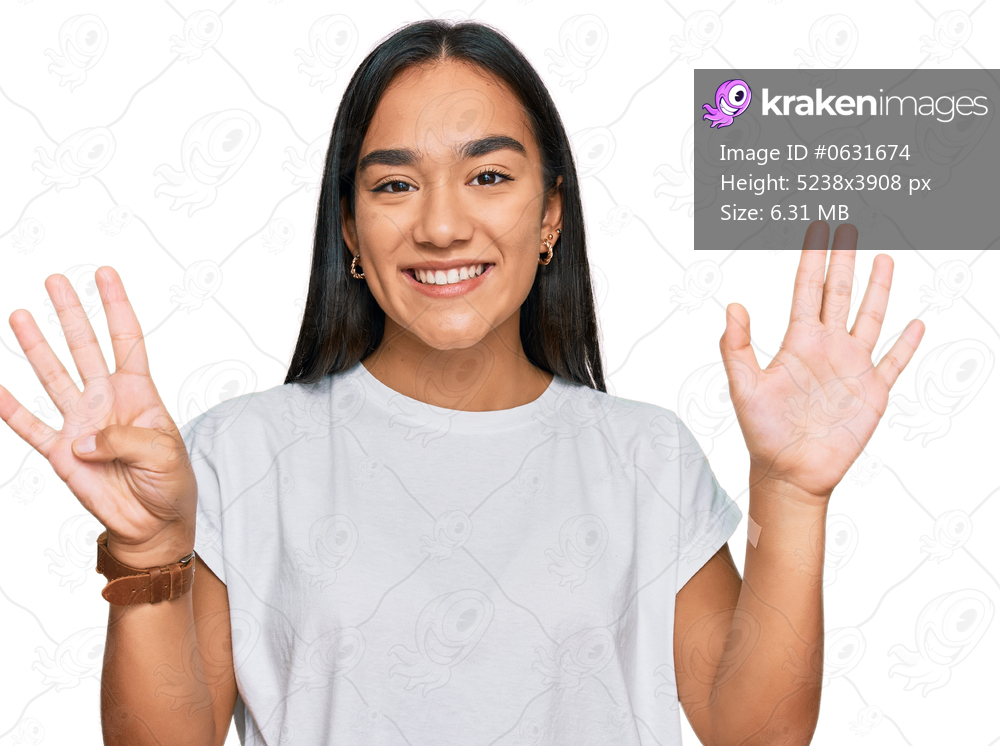 Young asian woman wearing casual white t shirt showing and pointing up with fingers number nine while smiling confident and happy. 