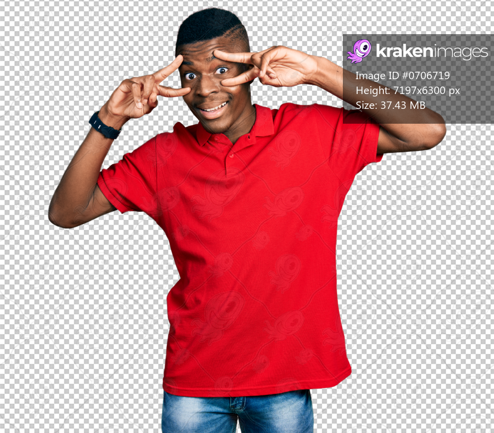 Young african american man wearing casual red t shirt doing peace symbol with fingers over face, smiling cheerful showing victory