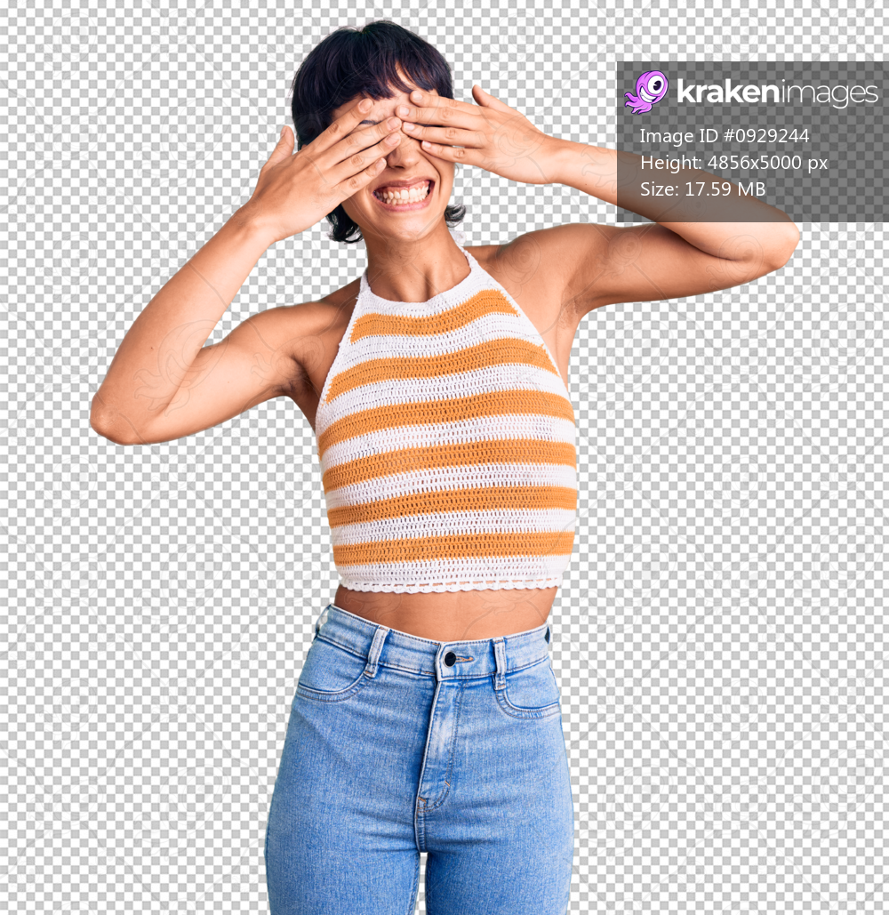 Young brunette woman with short hair wearing casual clothes covering eyes with hands smiling cheerful and funny. blind concept.