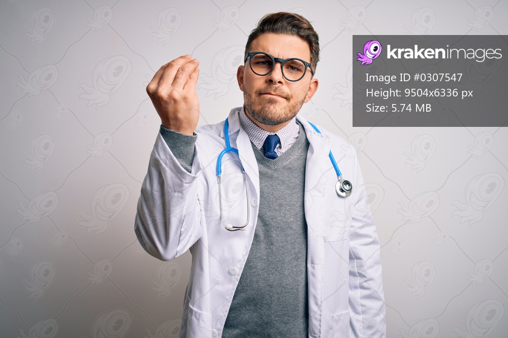 Young doctor man with blue eyes wearing medical coat and stethoscope over isolated background Doing Italian gesture with hand and fingers confident expression