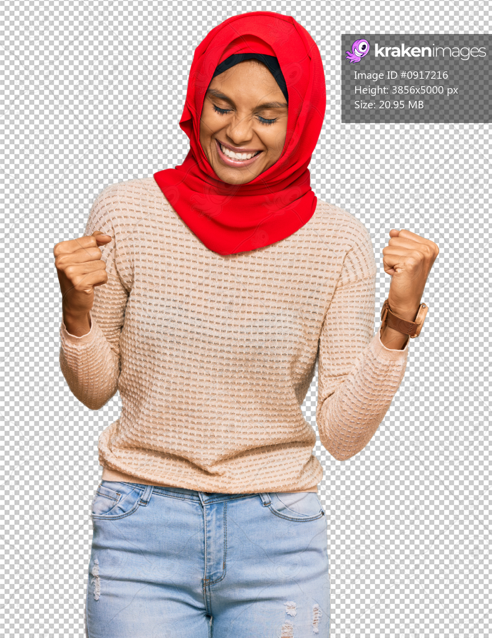 Young african american woman wearing traditional islamic hijab scarf very happy and excited doing winner gesture with arms raised, smiling and screaming for success. celebration concept.