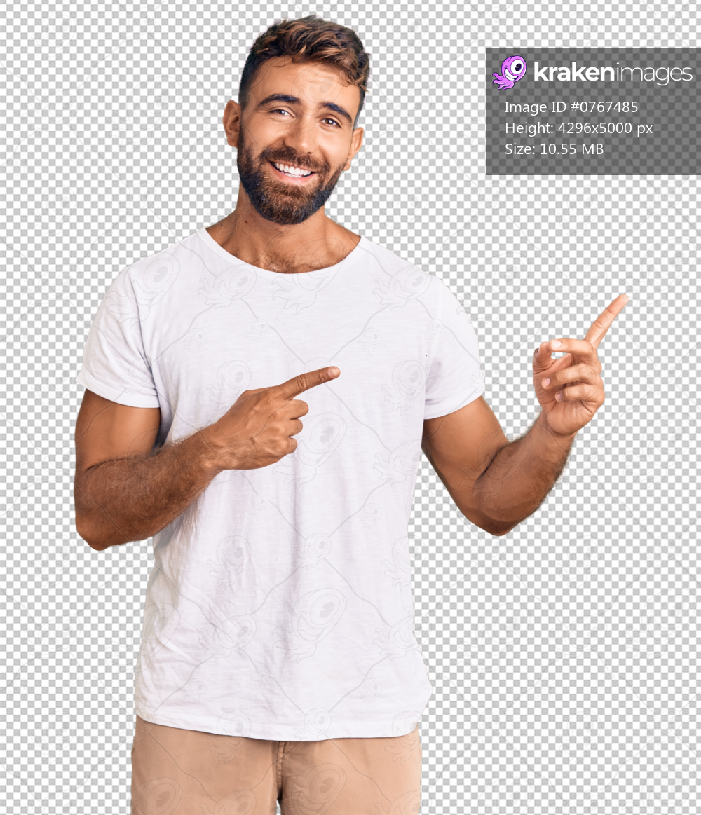 Young hispanic man wearing casual white tshirt smiling and looking at the camera pointing with two hands and fingers to the side.