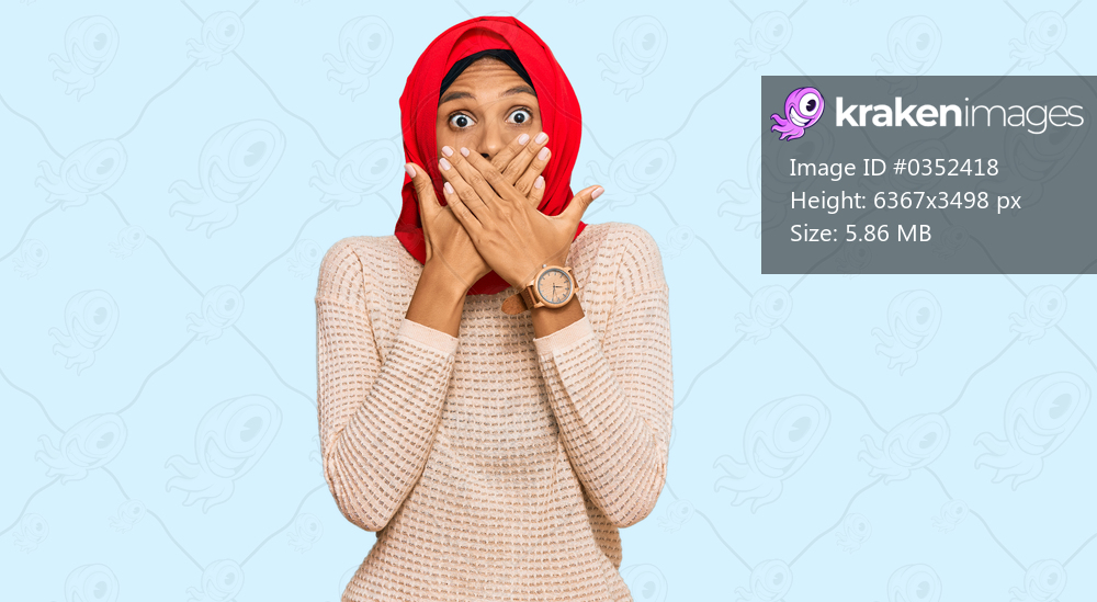 Young african american woman wearing traditional islamic hijab scarf shocked covering mouth with hands for mistake. secret concept. 