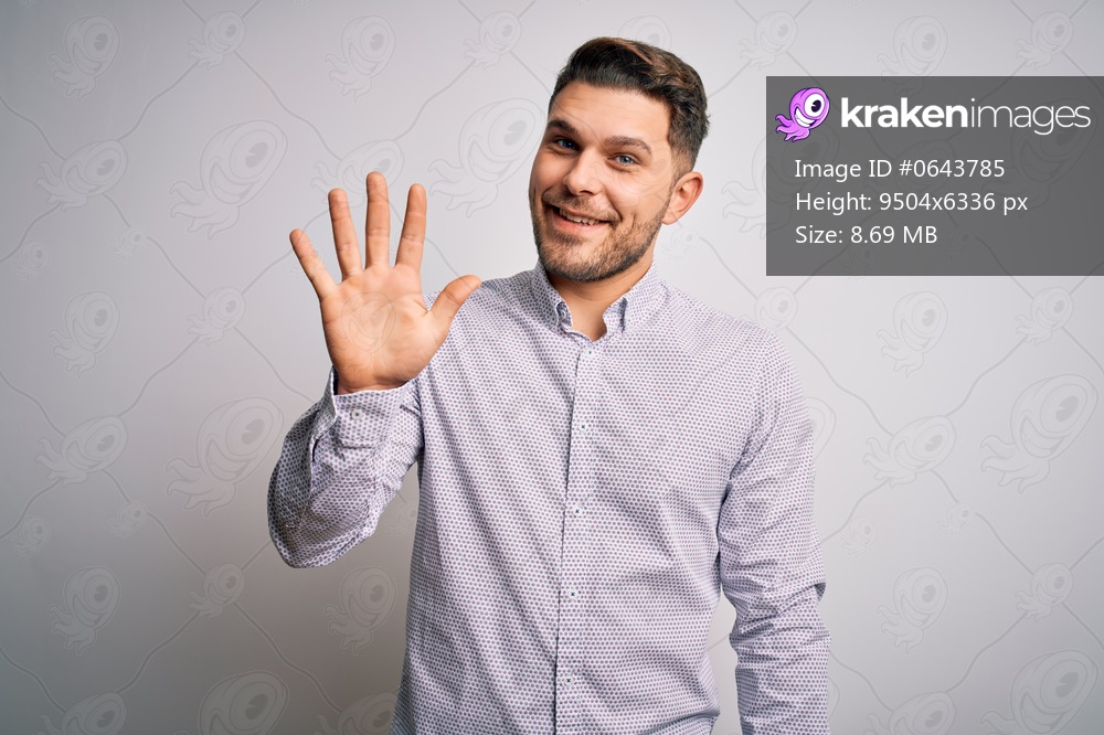 Young business man with blue eyes standing over isolated background showing and pointing up with fingers number five while smiling confident and happy.