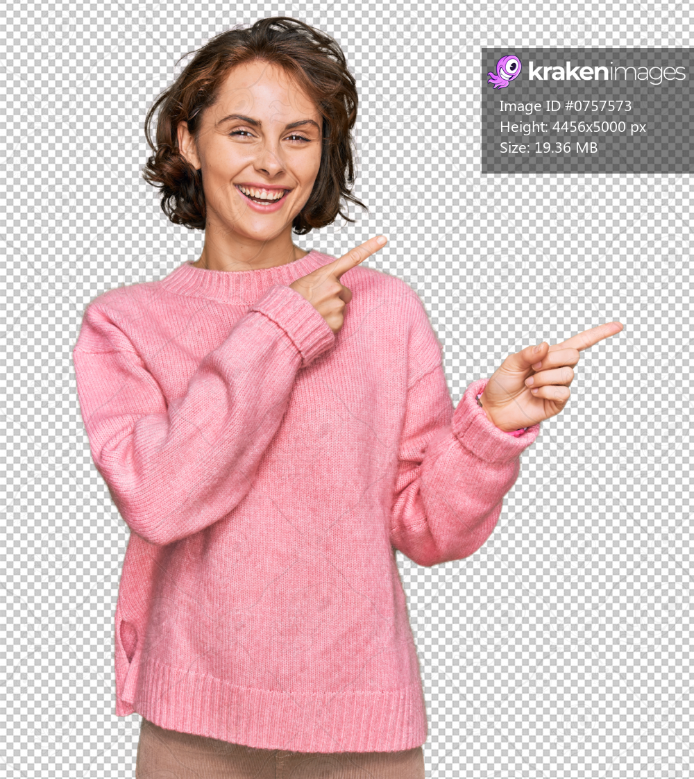 Young hispanic woman wearing casual clothes smiling and looking at the camera pointing with two hands and fingers to the side.