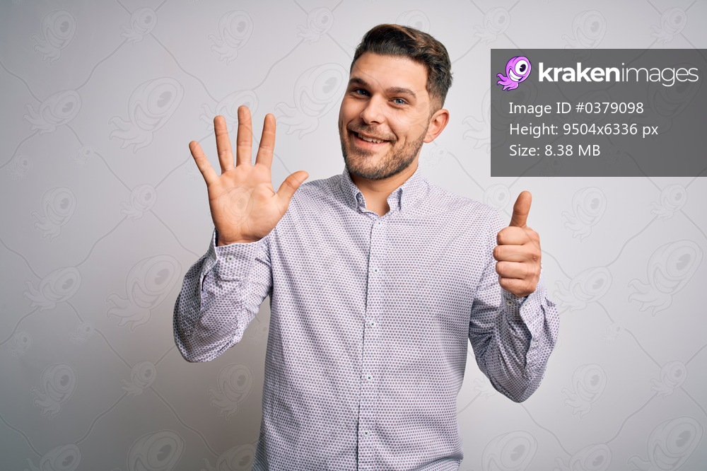 Young business man with blue eyes standing over isolated background showing and pointing up with fingers number six while smiling confident and happy.