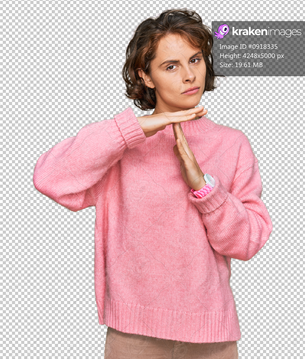 Young hispanic woman wearing casual clothes doing time out gesture with hands, frustrated and serious face